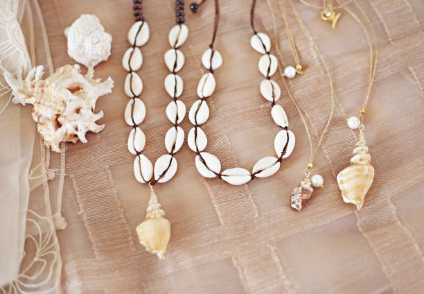 Comment faire un collier de coquillages ?